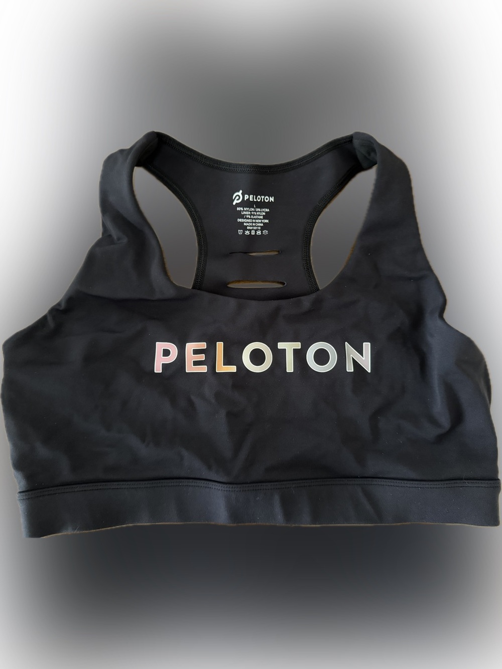 Peloton Black Sports Bra with Pastel Gradient Logo | L